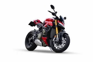 A new black and red motorcycle on an isolated plain white background in a studio